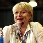 How Did Julie Dawn Cole Get Her Scar? netflixdeed.com